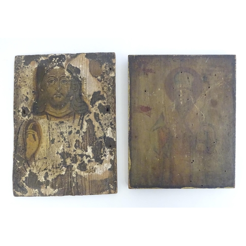 1173 - Two 19thC religious icons on panel, one depicting Jesus Christ, the other a saint, possibly St. Nich... 