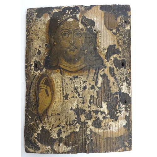 1173 - Two 19thC religious icons on panel, one depicting Jesus Christ, the other a saint, possibly St. Nich... 