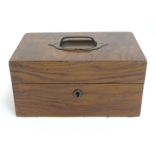 1183 - A late 19th / early 20thC walnut box with hinged lid and pull handle to top. Approx. 4 1/4