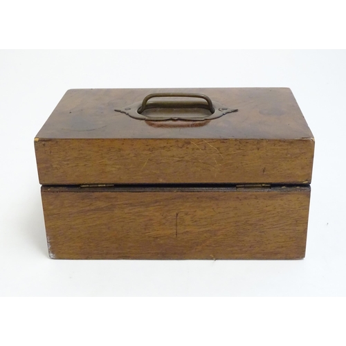 1183 - A late 19th / early 20thC walnut box with hinged lid and pull handle to top. Approx. 4 1/4