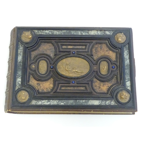 1185 - A late 19thC Austrian box formed as a book by Auguste Klein, the cover with inlaid carved panels dep... 