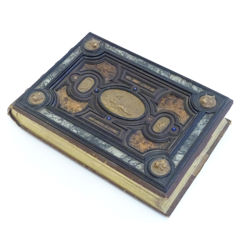 1185 - A late 19thC Austrian box formed as a book by Auguste Klein, the cover with inlaid carved panels dep... 