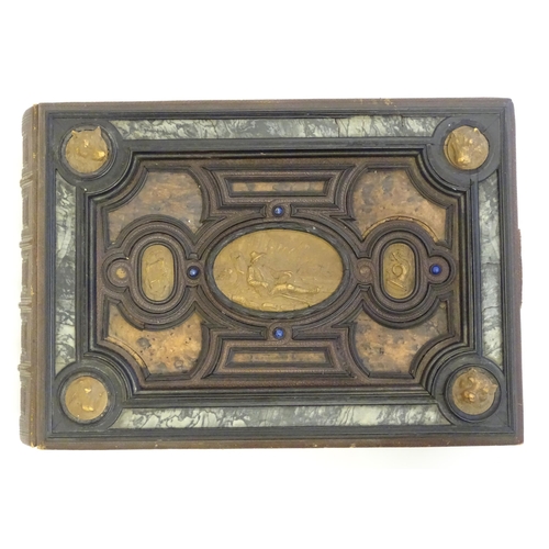 1185 - A late 19thC Austrian box formed as a book by Auguste Klein, the cover with inlaid carved panels dep... 