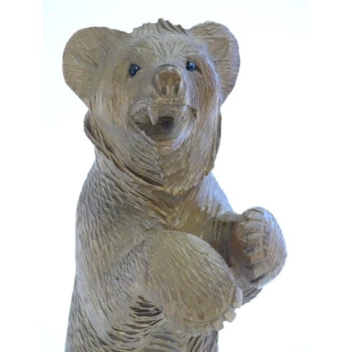 1267 - A Victorian black forest style carved wooden model of a bear standing. Approx. 7 1/2