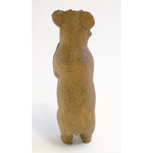 1267 - A Victorian black forest style carved wooden model of a bear standing. Approx. 7 1/2