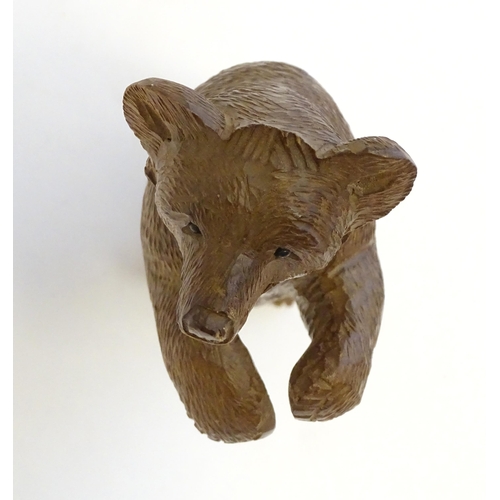 1267 - A Victorian black forest style carved wooden model of a bear standing. Approx. 7 1/2