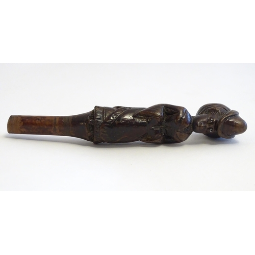 1285 - A Victorian carved walking cane handle modelled as a woman wearing a hat. Approx. 7 1/4