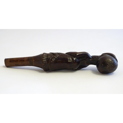 1285 - A Victorian carved walking cane handle modelled as a woman wearing a hat. Approx. 7 1/4