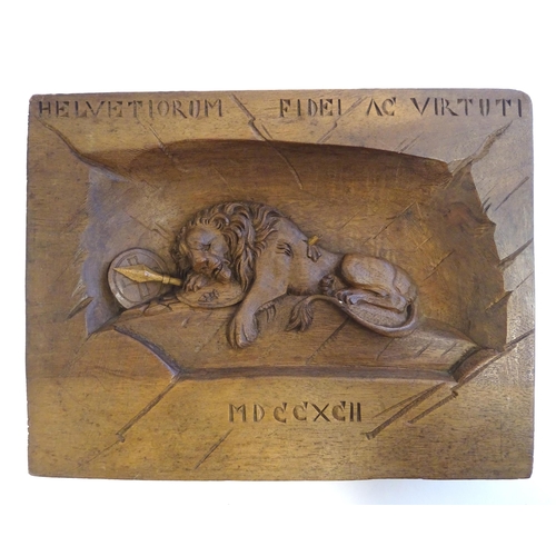 1290 - A 20thC Continental carved wooden wall plaque depicting The Lion of Lucerne, after Bertel Thorvaldse... 