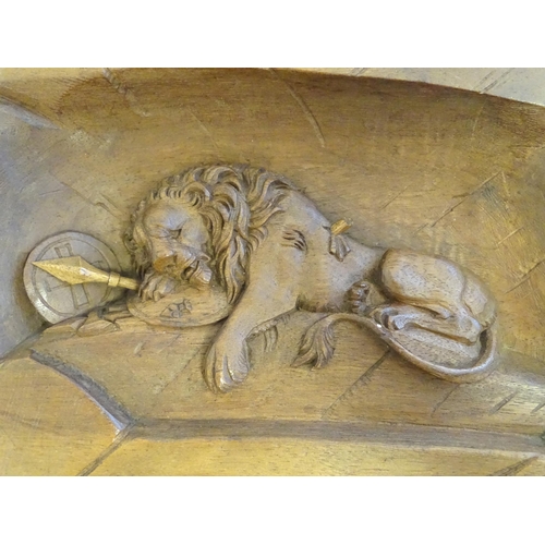 1290 - A 20thC Continental carved wooden wall plaque depicting The Lion of Lucerne, after Bertel Thorvaldse... 