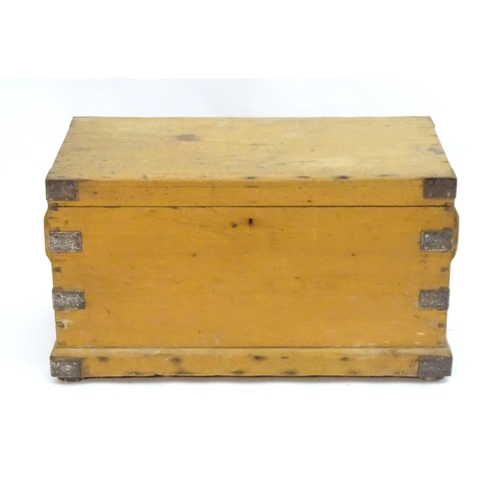 2082 - A late 19thC pine trunk with wrought metal corner brackets and metal lined interior. 41