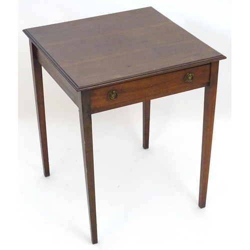 2086 - An early 20thC mahogany side table with a single short drawer with ring pull handles and four taperi... 