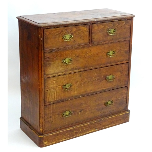 2101 - A late 19thC Victorian pine chest of drawers with a moulded top above two short over three long draw... 