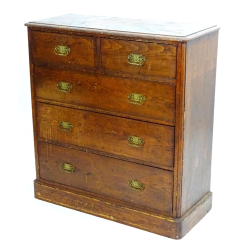 2101 - A late 19thC Victorian pine chest of drawers with a moulded top above two short over three long draw... 