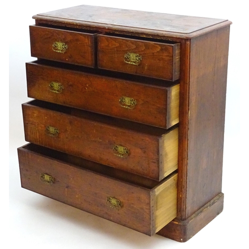 2101 - A late 19thC Victorian pine chest of drawers with a moulded top above two short over three long draw... 