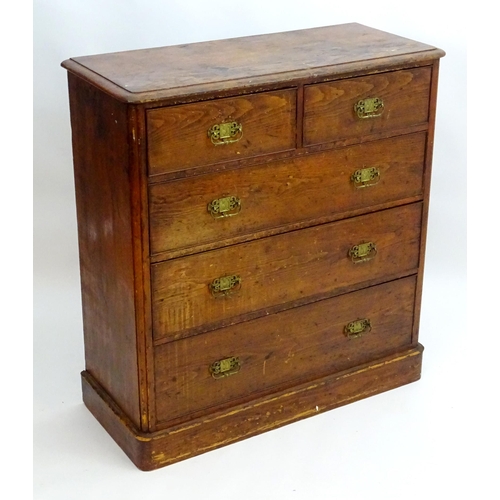 2101 - A late 19thC Victorian pine chest of drawers with a moulded top above two short over three long draw... 