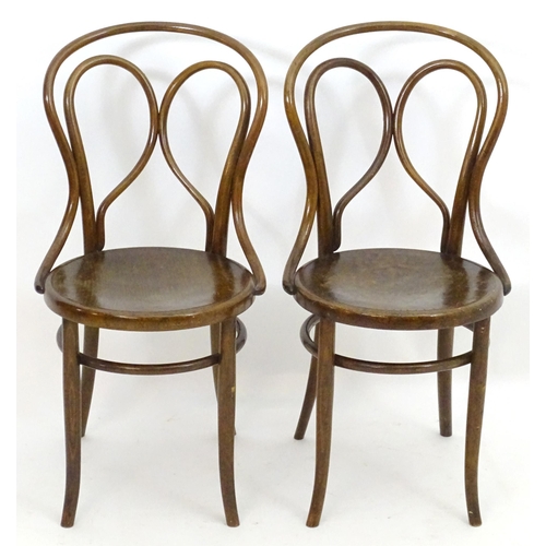 2108 - A pair of Thonet style Bentwood chairs with double bowed back rests and anthemion embossed seats. 18... 