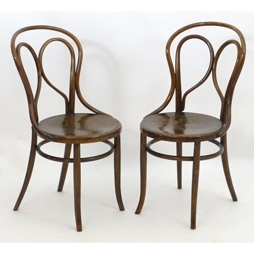 2108 - A pair of Thonet style Bentwood chairs with double bowed back rests and anthemion embossed seats. 18... 