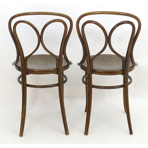 2108 - A pair of Thonet style Bentwood chairs with double bowed back rests and anthemion embossed seats. 18... 