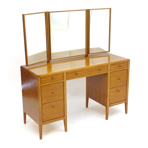 2213 - Vintage Retro, Mid-century: a Loughborough Furniture teak dressing table, with two flights of three ... 