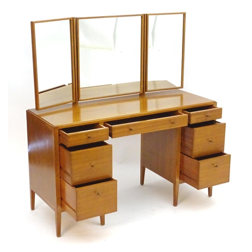 2213 - Vintage Retro, Mid-century: a Loughborough Furniture teak dressing table, with two flights of three ... 