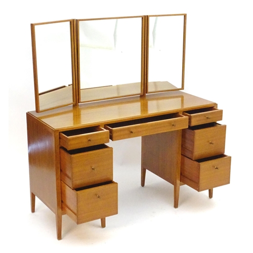 2213 - Vintage Retro, Mid-century: a Loughborough Furniture teak dressing table, with two flights of three ... 