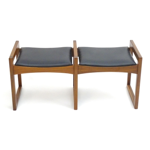 2221 - Vintage Retro, Mid-century: an afrormosia twin stool, the leatherette seats with three quadrille sup... 