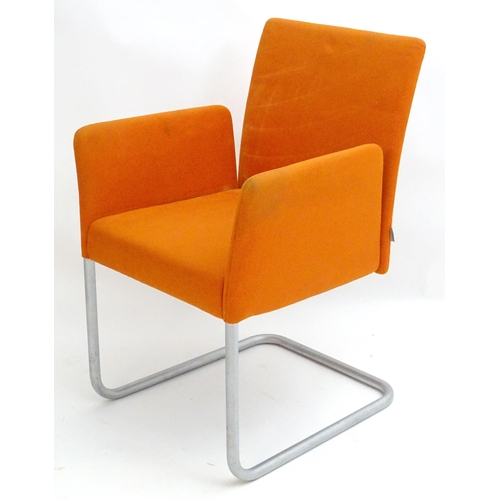 2224 - Vintage Retro, Mid-century: a Walter Knoll cantilever armchair with orange upholstery, approximately... 