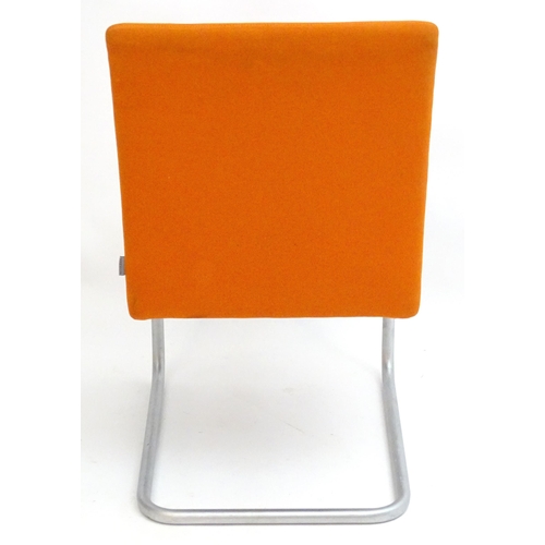 2224 - Vintage Retro, Mid-century: a Walter Knoll cantilever armchair with orange upholstery, approximately... 