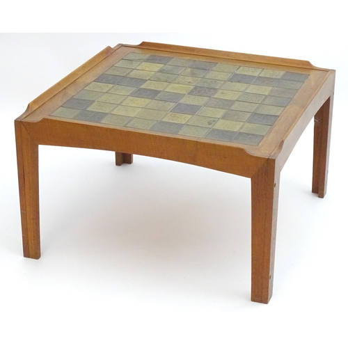 2225 - Vintage Retro, Mid-century: a teak coffee table, of squared form and inset with 64 studio pottery ti... 