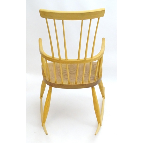 2226 - A 21stC elm Windsor rocking chair, 41 1/2