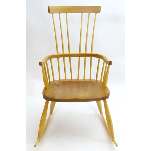 2226 - A 21stC elm Windsor rocking chair, 41 1/2