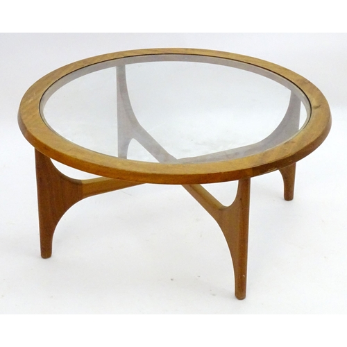 2235 - Vintage Retro, Mid-century: Stateroom by Stonehill, a teak coffee table with circular glazed top sup... 