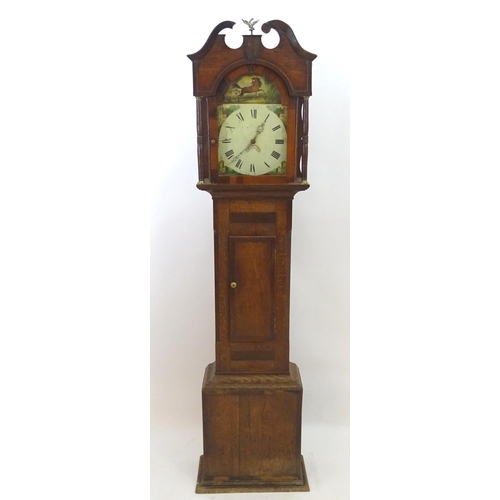 2279 - An oak cased long case clock with 30 hour movement and 12