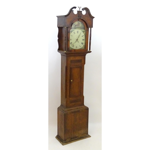 2279 - An oak cased long case clock with 30 hour movement and 12