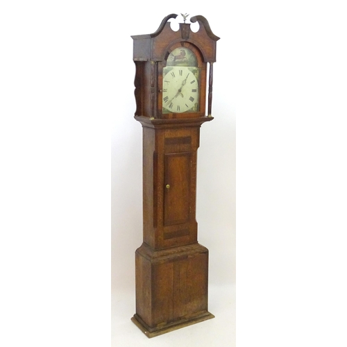 2279 - An oak cased long case clock with 30 hour movement and 12