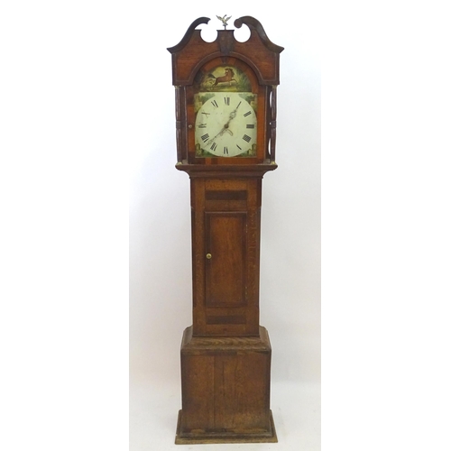 2279 - An oak cased long case clock with 30 hour movement and 12