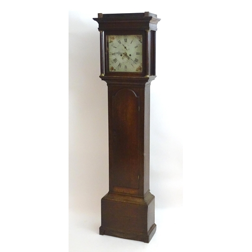 2281 - Francis Mee - Higham Ferrers : An oak cased 8-day long case clock with painted break arch 12