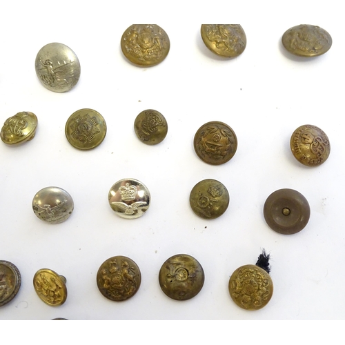 1344 - A collection of 20thC military tunic buttons, including the Durham Light Infantry, The York and Lanc... 