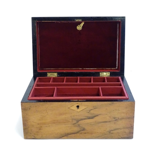 1359 - A late 19th / early 20thC walnut jewellery box with marquetry / parquetry detail to top and fitted l... 