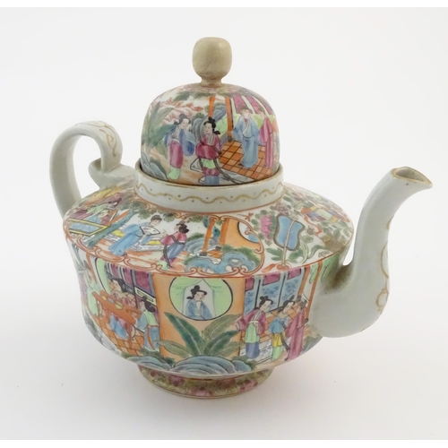 23 - A Chinese famille rose teapot decorated with figures drinking tea, figures on a terrace with fans, c... 