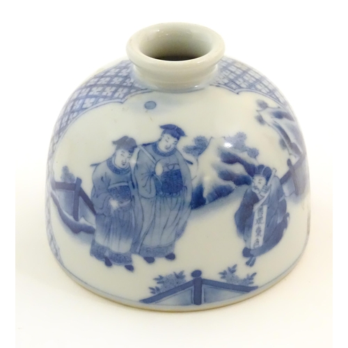 31 - A Chinese blue and white ink pot of dome form decorated with scholars with scrolls in a landscape. C... 