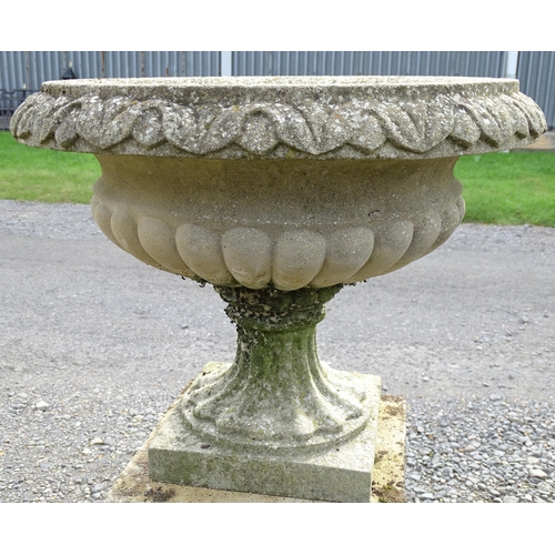 1592 - Garden & Architectural, Salvage: a pair of mid 20thC reconstituted stone classical urns, standing on... 