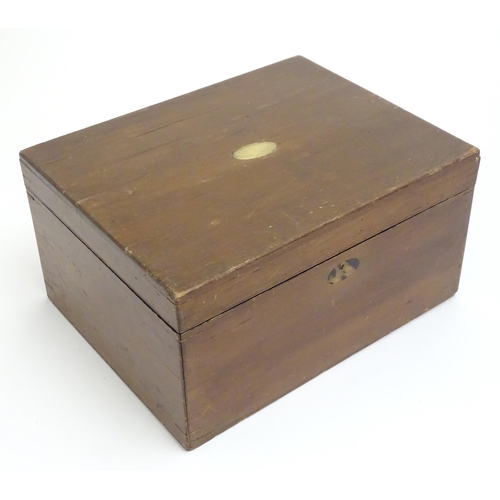 1478 - Toys: A late 19th / early 20thC mahogany games box / compendium with two tier fitted interior contai... 