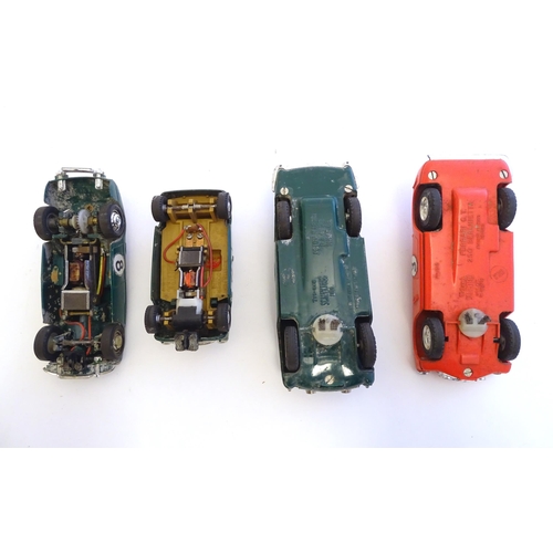 1485 - Toys: Four Tri-ang Scalextric model motor racing cars comprising Austin Healey 3000, Aston Martin DB... 