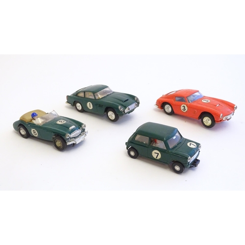 1485 - Toys: Four Tri-ang Scalextric model motor racing cars comprising Austin Healey 3000, Aston Martin DB... 