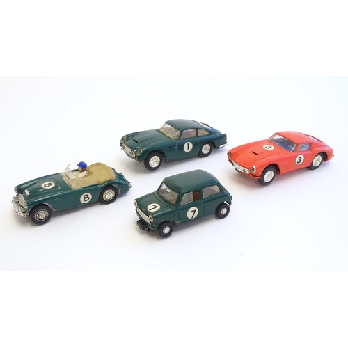 1485 - Toys: Four Tri-ang Scalextric model motor racing cars comprising Austin Healey 3000, Aston Martin DB... 