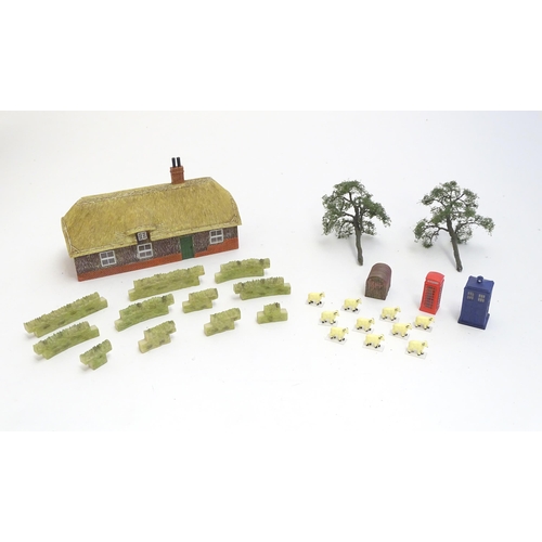 1489 - Toys: A quantity of Hornby accessories comprising Honeysuckle Cottage, no. R9675 and an Anderson She... 