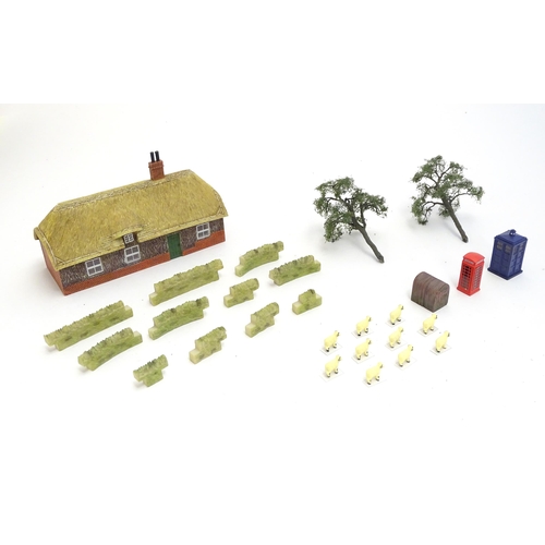 1489 - Toys: A quantity of Hornby accessories comprising Honeysuckle Cottage, no. R9675 and an Anderson She... 