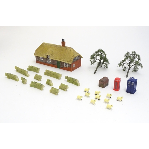 1489 - Toys: A quantity of Hornby accessories comprising Honeysuckle Cottage, no. R9675 and an Anderson She... 